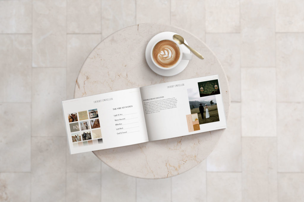 Mock-Up of Desert Dweller Moodboard Book open on a marble table with a cup of coffee designed by Kin & Co. Design Studio a strategic brand and website designer.